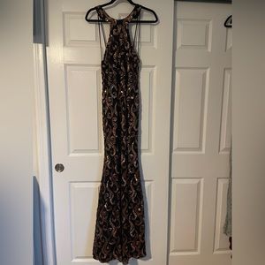 Black and gold long formal dress. Wore one time for pageant pictures